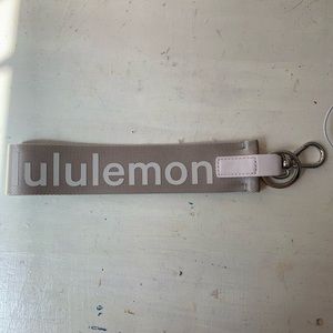 white lululemon keychain never lost
